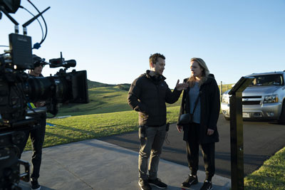 Writer-director Leigh Whannell and Elisabeth Moss and on the set of <i>The Invisible Man</i>.